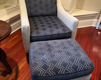Wesley Hall upholstered armchair and matching ottoman....
