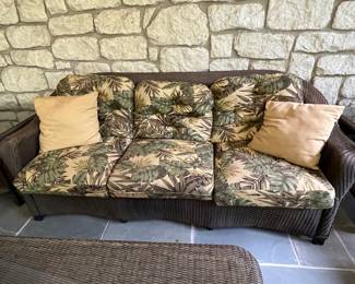 Lloyd Flanders sofa with upholstered cushions