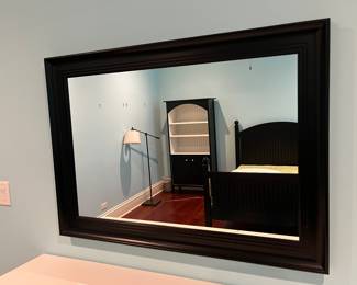 Painted black framed wall mirror