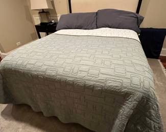 King upholstered headboard and wood frame