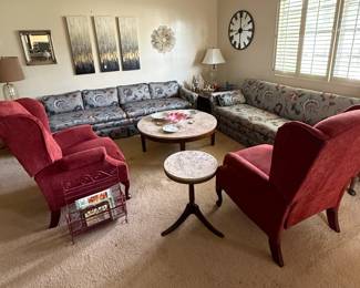 2 matching sofas (one is a sofa bed) , 2 wing-back recliners, marble-topped coffee table, marble-topped side table, various end tables, side tables and more! 