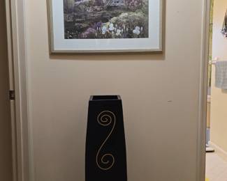 assorted framed wall art, vases, and home decor
