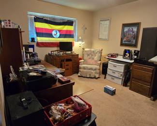 Room full of interesting stuff ... books, chairs, desks, drawing desks, file cabinets, office supplies, shelves, tv cabinet, CDs/DVDs, CD/Radio player and more!