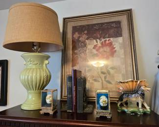Collectible eggs in glass showcases, vintage German Shepherd porcelain vase,  large variety of lamps  and wall art