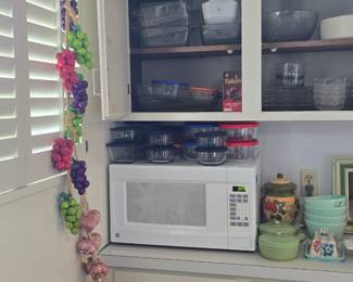 several microwaves to choose from, storage bowls, dishes, serving dishes, bakeware, etc