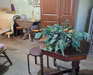 storage cabinet, drop leaf table, misc occasional chairs, spindle leg table and much more!