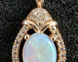 10K Yellow Gold Opal And .15 CTW Diamond Pendant