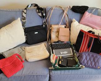 variety of purses, bags and wallets