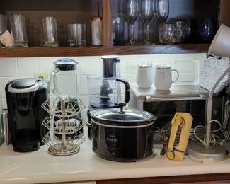 small kitchen appliances, coffee cups, glassware
