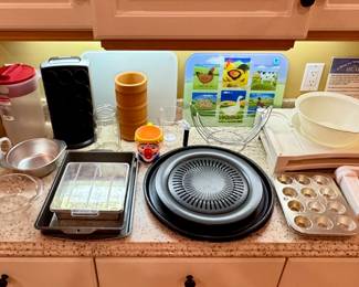 Crumble Cake Cutter • Cake and Cupcake Tins • Banana Hammock (Ha!) • Corkscrews • Pitcher • Cutting Board • Misc. Bowls • Coffee Mugs