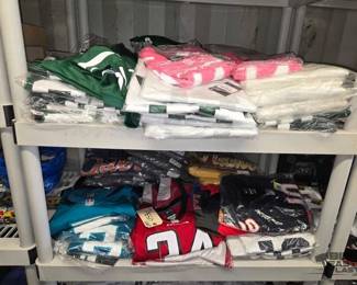 4536 2 Shelves of Jerseys and Hoodies