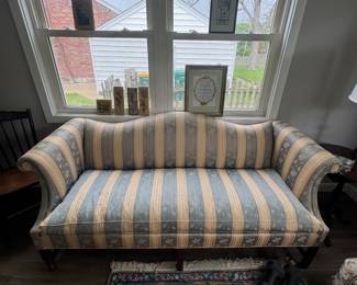 antique camel back sofa