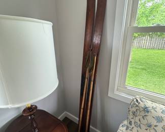 antique wooden skis with poles