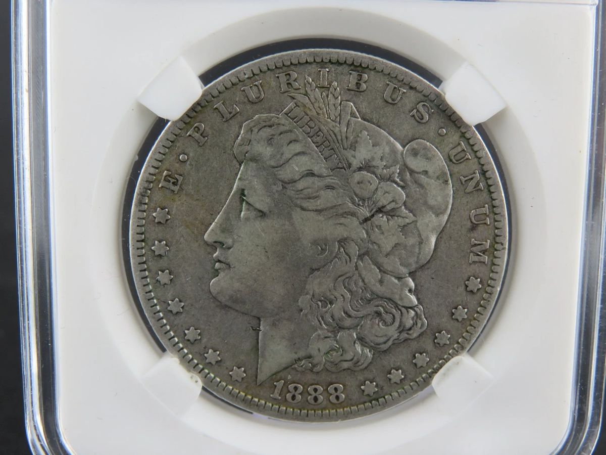 Lot 7. 1888 O Morgan Silver Dollar