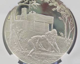 Lot 320. Franklin Mint Postmasters of America 1974 sterling silver round weighing 24.0 grams