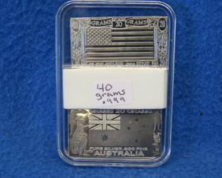 Lot 229. Two 20-gram .999 silver bars from the Silver Mint Nations series. 40 grams total.