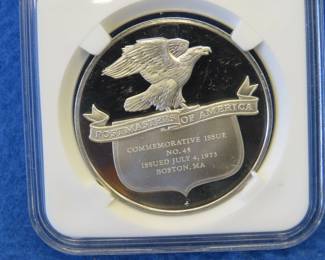 Lot 378. Franklin Mint Postmasters of America 1975 sterling silver round weighing 24.7 grams