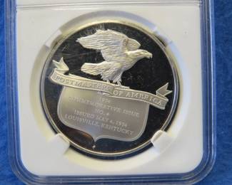 Lot 283. Franklin Mint Postmasters of America 1974 sterling silver round weighing 24.7 grams