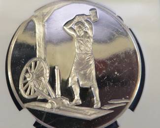 Lot 327. Franklin Mint Postmasters of America 1977 sterling silver round weighing 24.3 grams