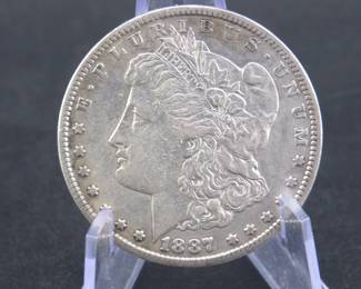 Lot 133. 1887 S Morgan silver dollar