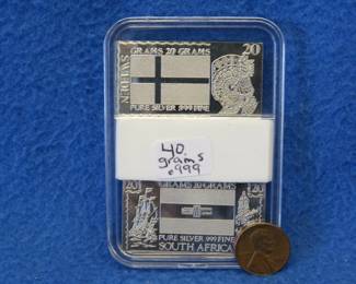 Lot 228. Two 20-gram .999 silver bars from the Silver Mint Nations series. 40 grams total.