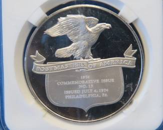 Lot 379. Franklin Mint Postmasters of America 1975 sterling silver round weighing 25.1 grams