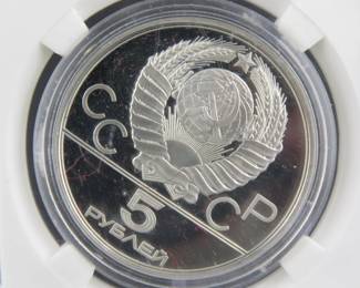 Lot 75. USSR 1980 Olympic 5 Ruble coin contains .999% silver and weighs .48 oz. Notwithstanding the label, minted in the USSR.