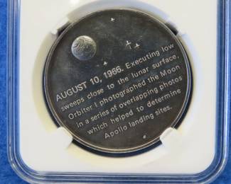 Lot 352. Franklin Mint America In Space Lunar Orbiter 1 sterling silver round weighing 27.2 grams