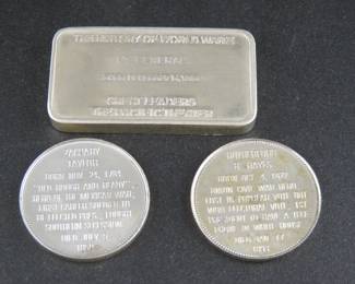 Lot 29. James Doolittle Lincoln Mint bar with 44.44 grams of sterling and two Franklin Mint President Portrait sterling rounds with15.32 grams of sterling.