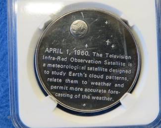 Lot 353. Franklin Mint America In Space Tiros I sterling silver round weighing 26.5 grams