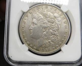 Lot 203. 1886 P Morgan silver dollar