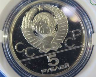 Lot 257. USSR 1980 Olympic 10 Ruble coin contains 90% silver and weighs .48 oz. Notwithstanding the label, Minted in the USSR