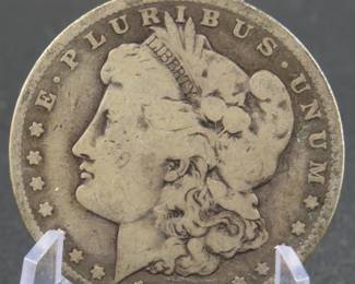 Lot 383. 1889 O Morgan silver dollar
