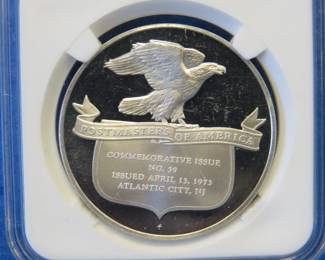 Lot 396. Franklin Mint Postmasters of America 1973 sterling silver round weighing 26.7 grams