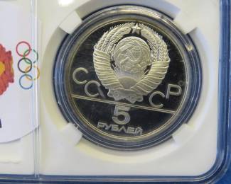 Lot 290. USSR 1980 Olympic 5 Ruble coin contains .999 silver and weighs .48 oz. Notwithstanding the label, minted in the USSR.