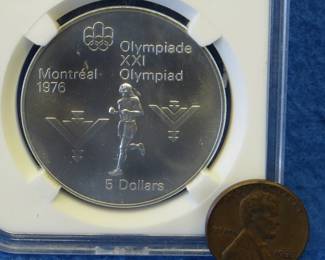 Lot 310. 1976 Canadian $5 proof sterling silver coin weighing 23.8 grams