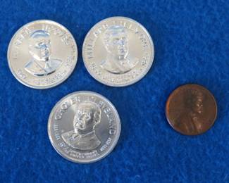Lot 404. Three sterling silver Presidential collector coins. Total weight 22.8 grams