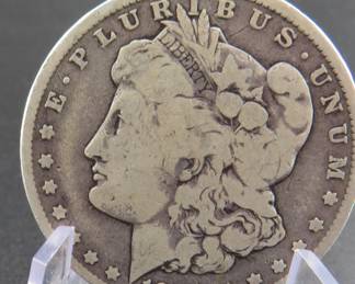 Lot 385. 1900 O Morgan silver dollar