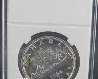 Lot 174. 1966 Canadian 80% silver dollar. 23.33 grams.