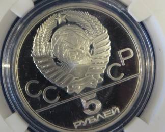 Lot 256. USSR 1980 Olympic 10 Ruble coin contains 90% silver and weighs .48 oz. Notwithstanding the label, Minted in the USSR