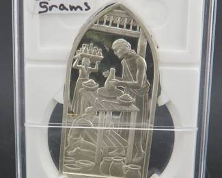Lot 173. Franklin Mint sterling silver ingot. Thessalonians II. 32.2 grams.