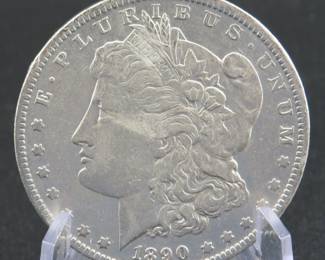 Lot 382. 1890 O Morgan silver dollar