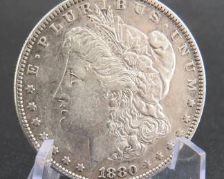 Lot 386. 1880 O Morgan silver dollar