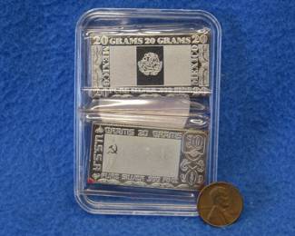 Lot 225. Two 20-gram .999 silver bars from the Silver Mint Nations series. 40 grams total.