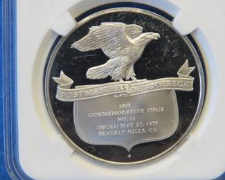 Lot 376. Franklin Mint Postmasters of America 1975 sterling silver round weighing 24.8 grams