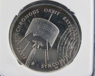 Lot 41. Franklin Mint America In Space 1963 Syncom II sterling silver round weighing 26.1 grams