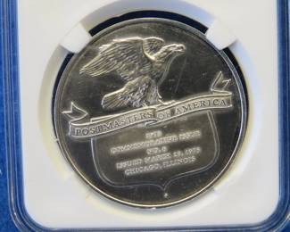 Lot 395. Franklin Mint Postmasters of America 1975 sterling silver round weighing 24.9 grams