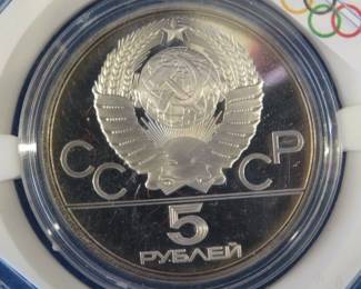 Lot 252. USSR 1980 Olympic 10 Ruble coin contains 90% silver and weighs .48 oz. Notwithstanding the label, Minted in the USSR