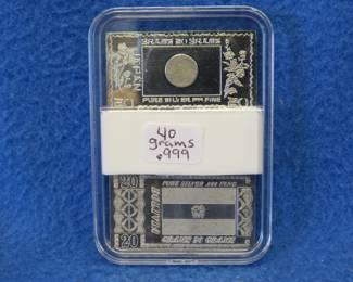 Lot 227. Two 20-gram .999 silver bars from the Silver Mint Nations series. 40 grams total.