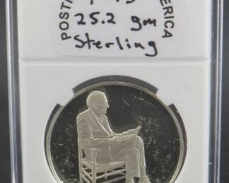Lot 149. Franklin Mint 1973 Postmasters of America sterling silver round weighing 25.2 grams